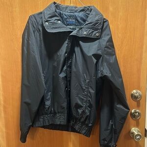 Women’s 100% waterproof jacket size medium